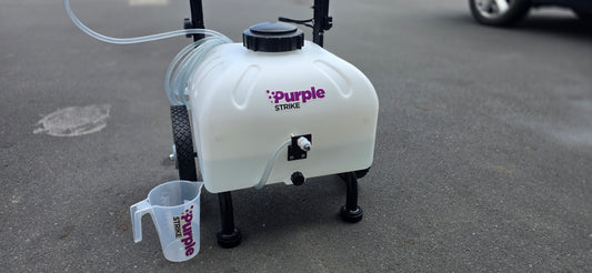 Close-up of the Purple Strike 34L cart sprayer tank, cap, hose fitting and branding